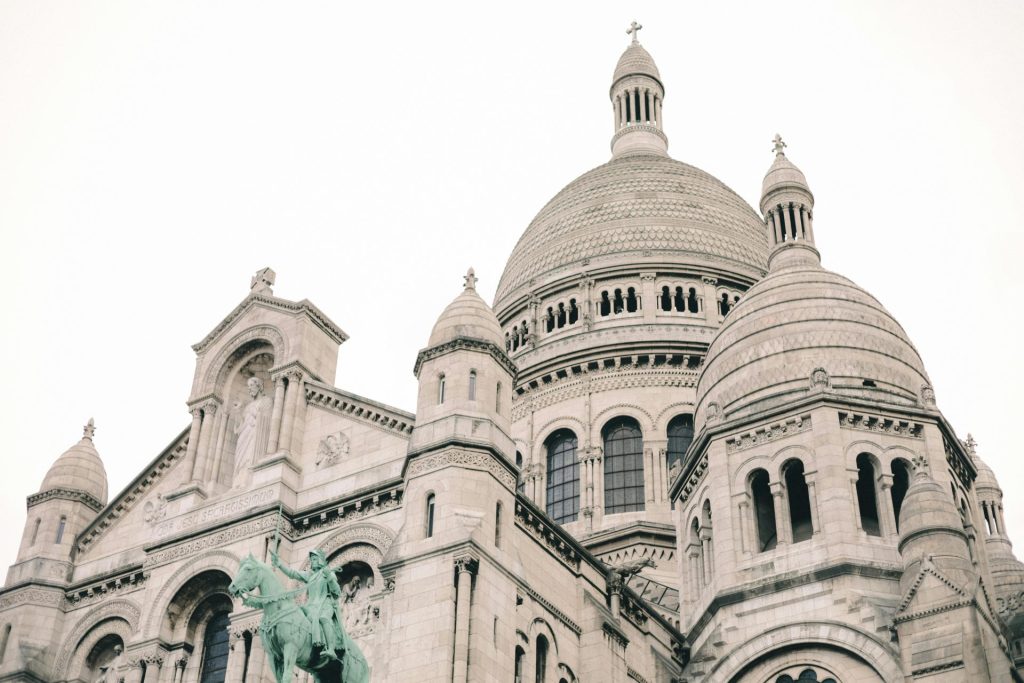 Captivating view of the Sacre Coeur Basilica's intricate domes in Paris, France.